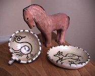 Ceramic horse, cup and saucer. 1950s.